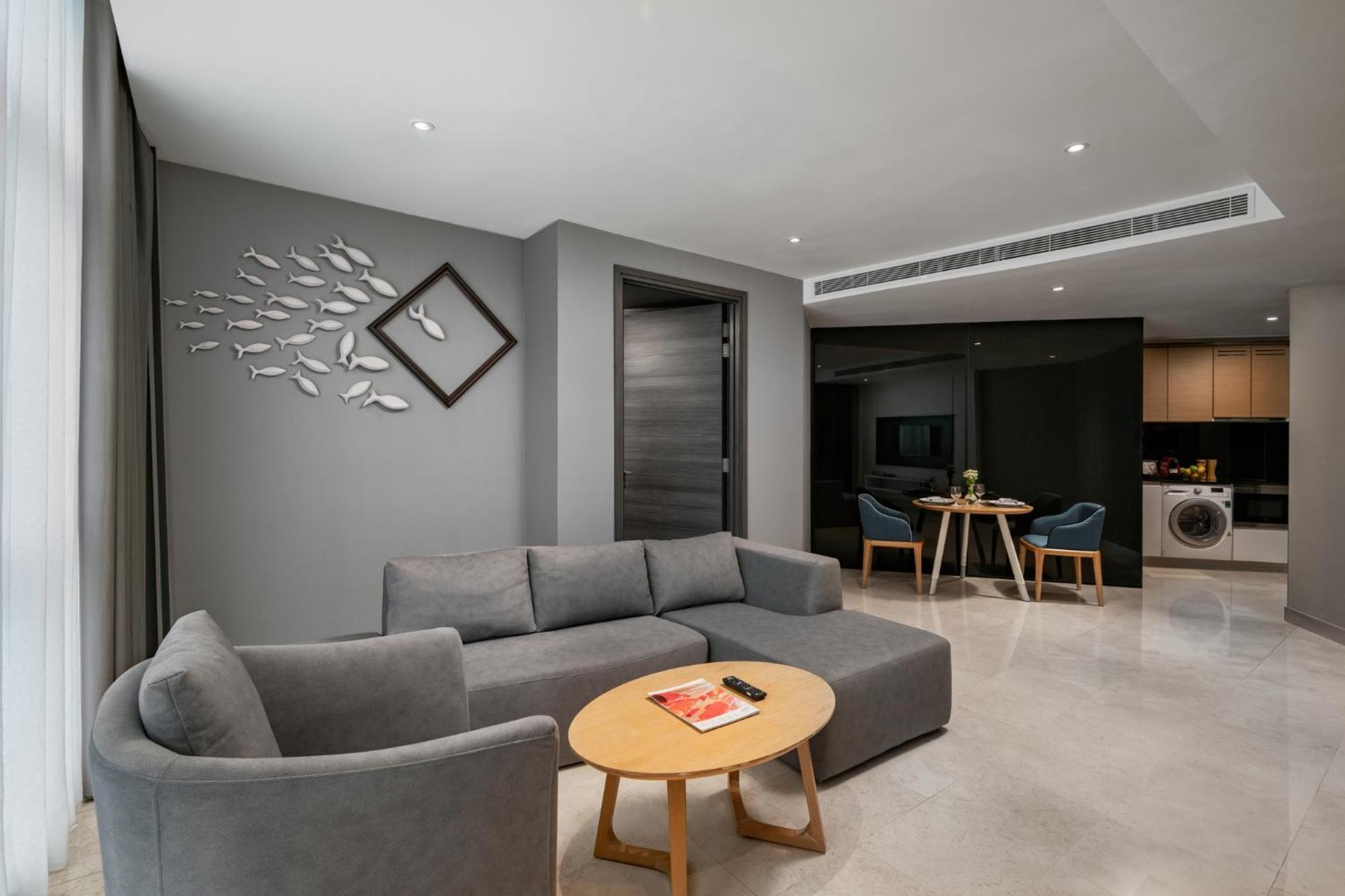 Fraser Place Puteri Harbour Nusajaya (Iskandar Puteri) Exterior foto A living room in a serviced apartment in Singapore